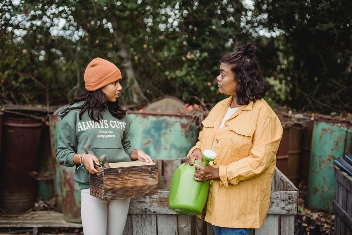 a mother candidly conversing with her daughter and showing support