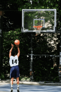 an A Level student playing basketball