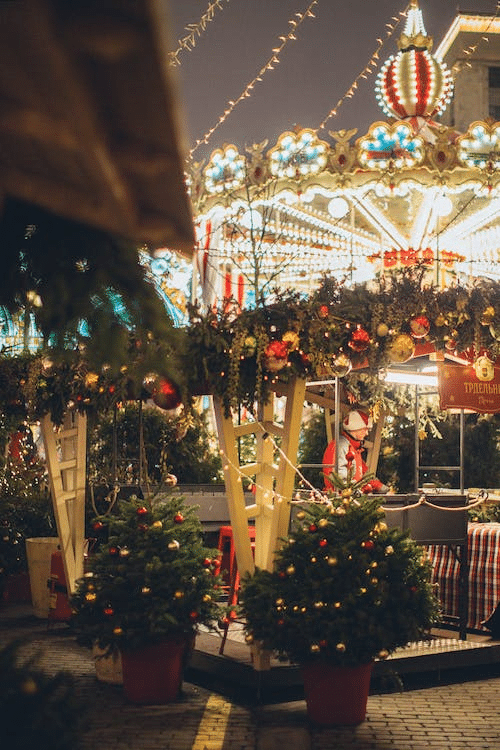 a brightly lit Christmas market