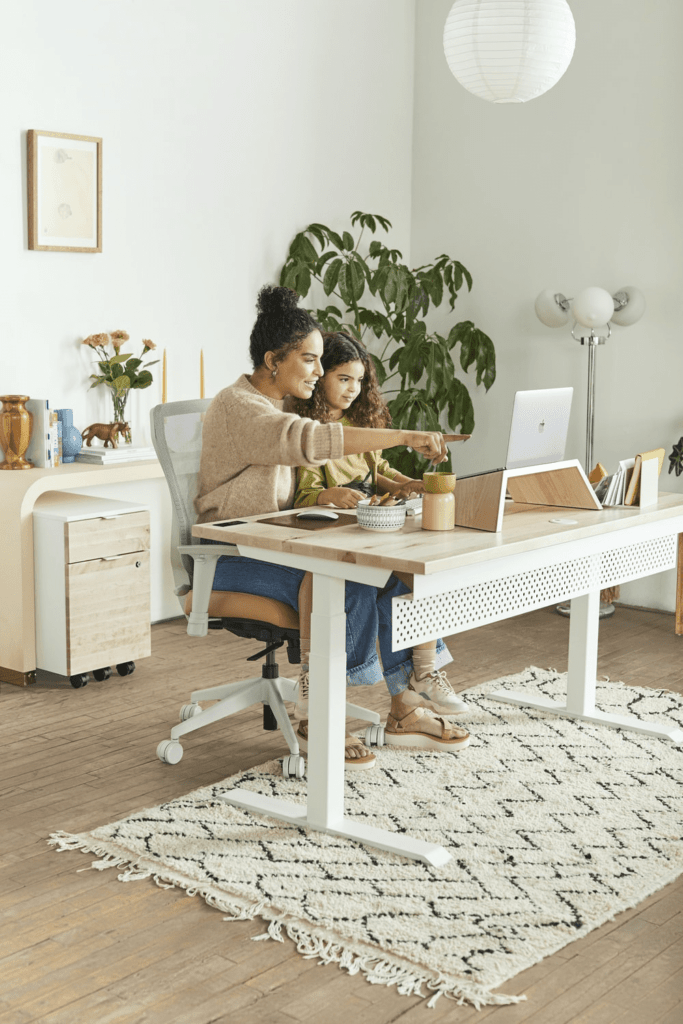 a mother setting up her daughter’s online classes