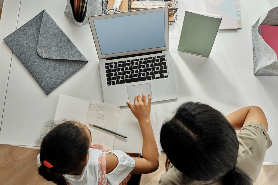 A student taking online primary prep homeschooling under parent supervision