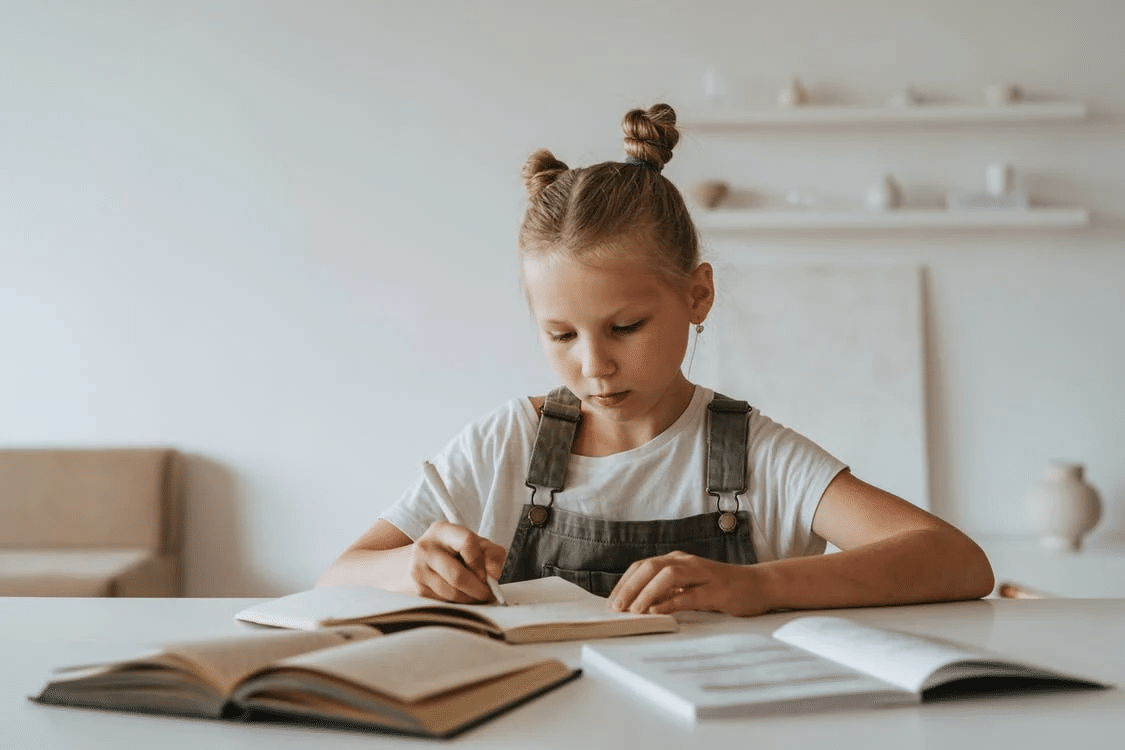 a mother helping her child revise