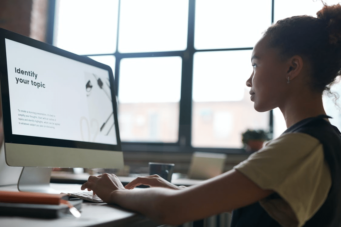 a high school student reviewing a presentation