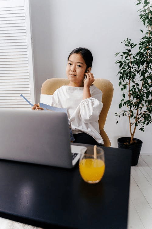 a girl attending online school