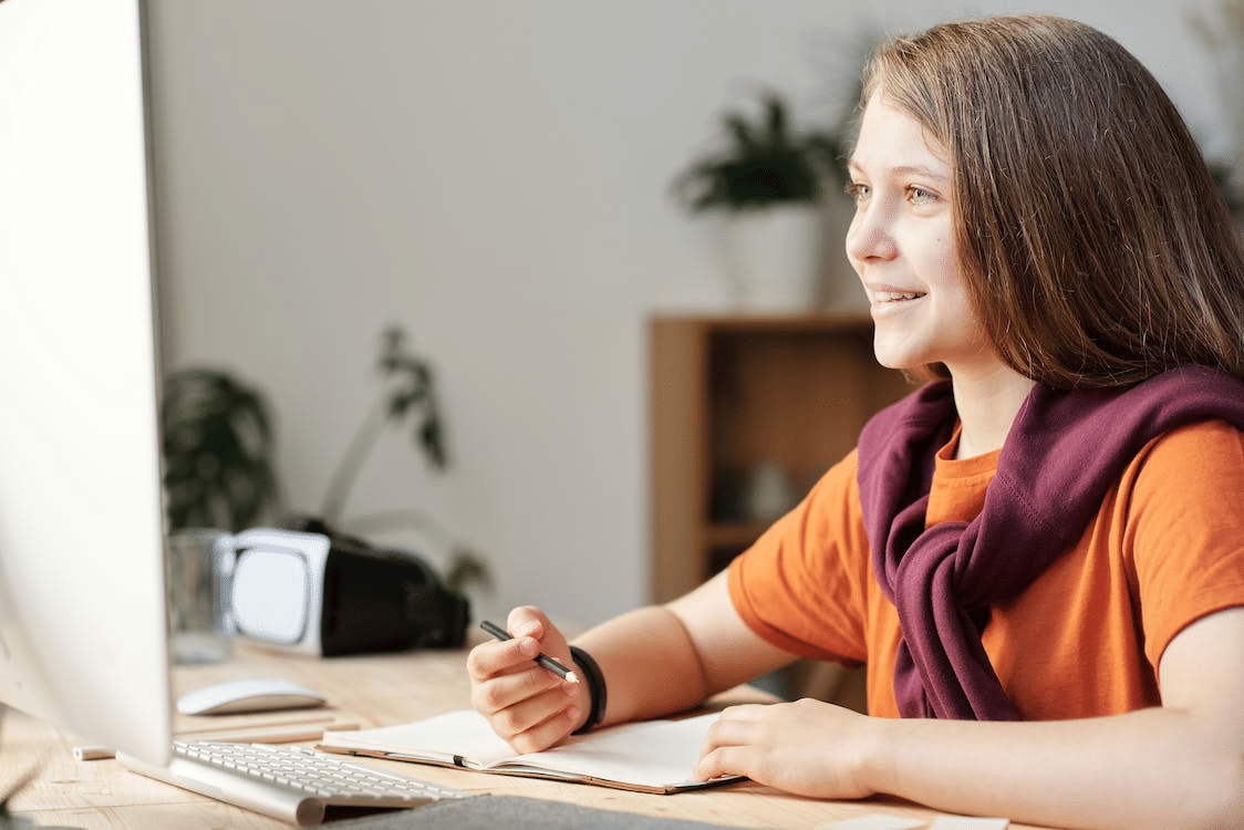 girl attending an online booster class over the holidays