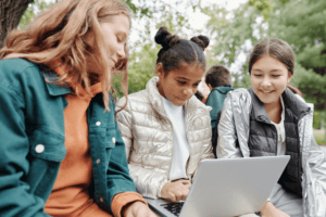 three girls learning concepts in the best online homeschooling program in the UK