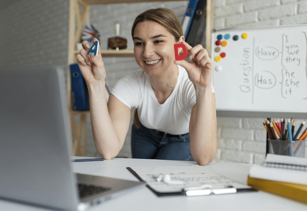 a British teacher offering an online SPAG lesson to her students