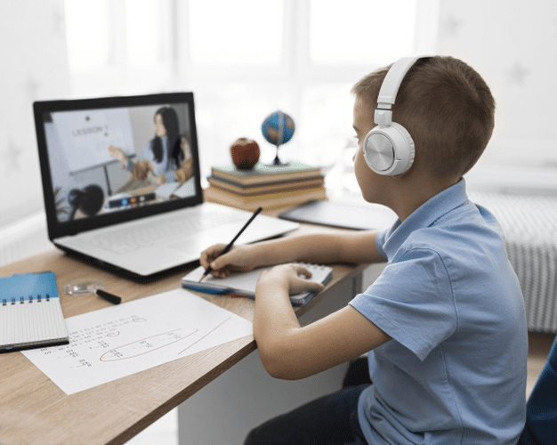 a boy attending online school