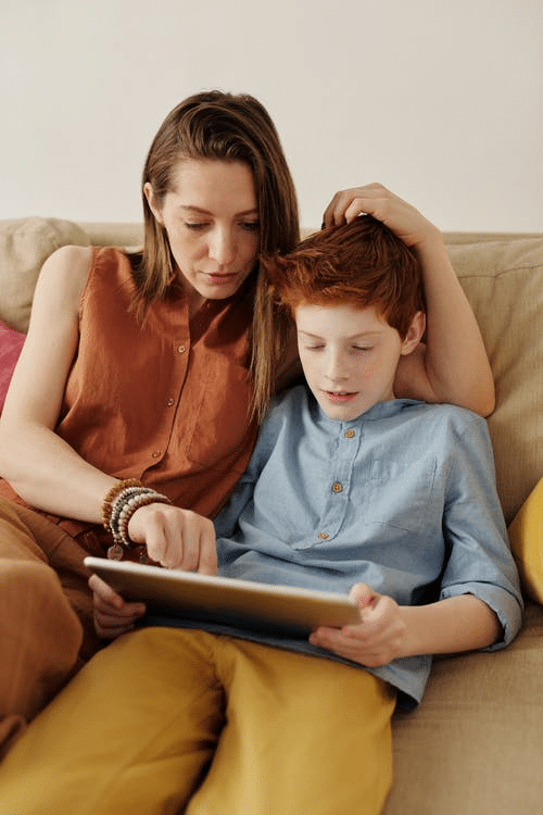 a parent helping her child with after class revision