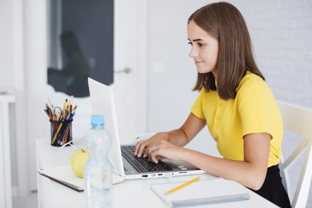 a student attending online school to prepare for her IGCSEs