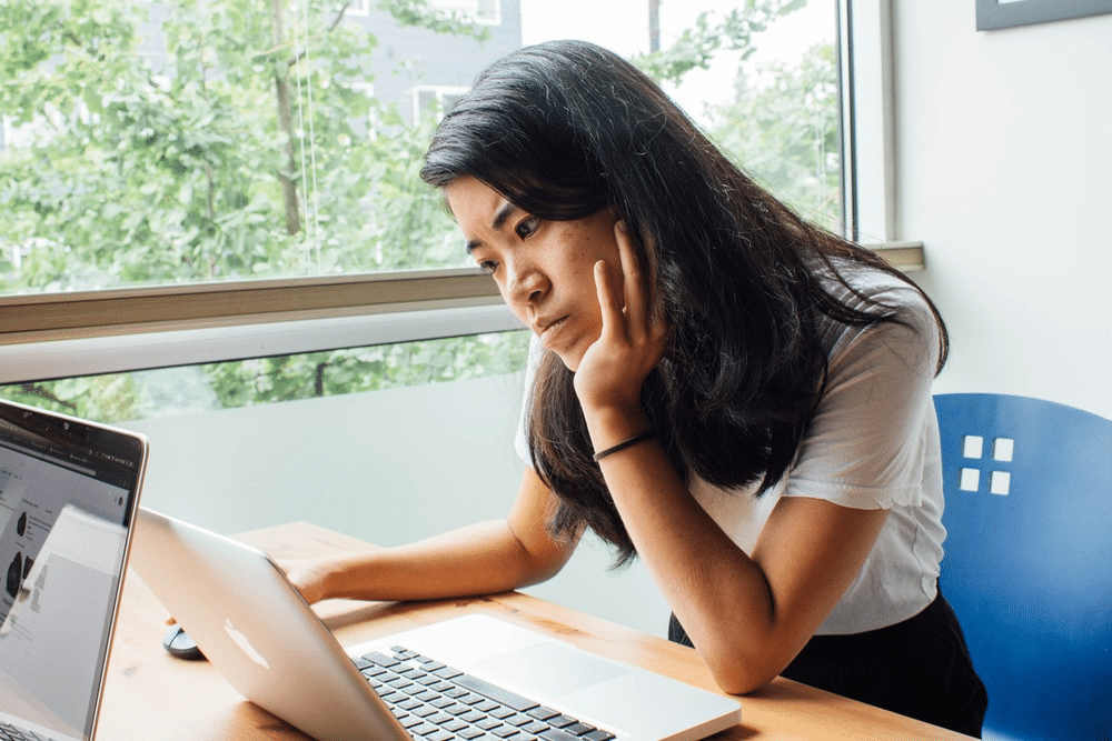 a student completing her online mock exam