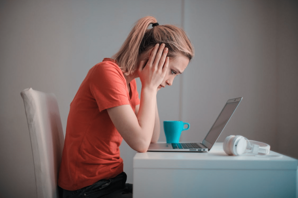 a student feeling confused and overwhelmed as she struggles to self study