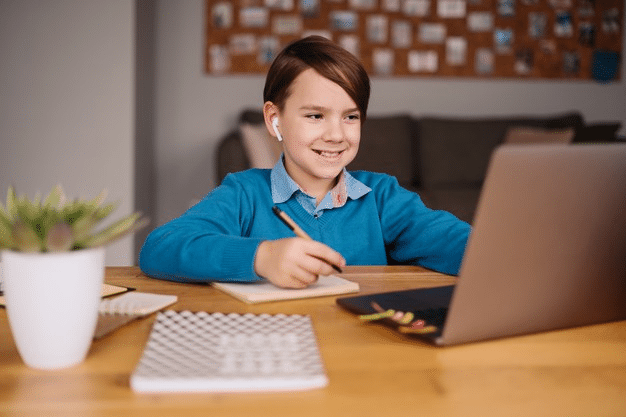 a student interacting with his peers as he attends online school