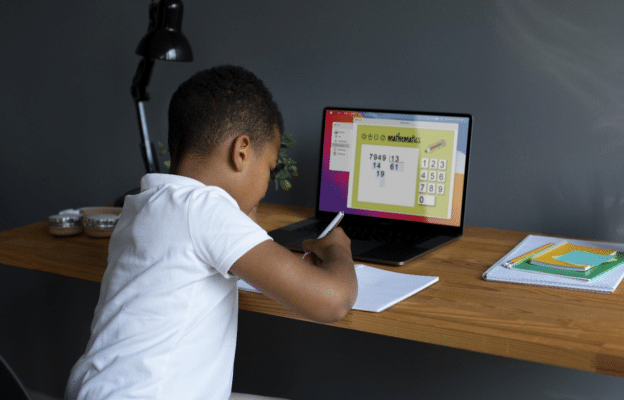 a student revising using Cambridge Home School’s educational resources