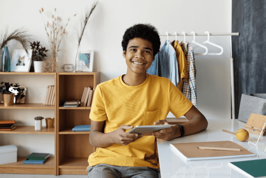 a student smiling at the camera