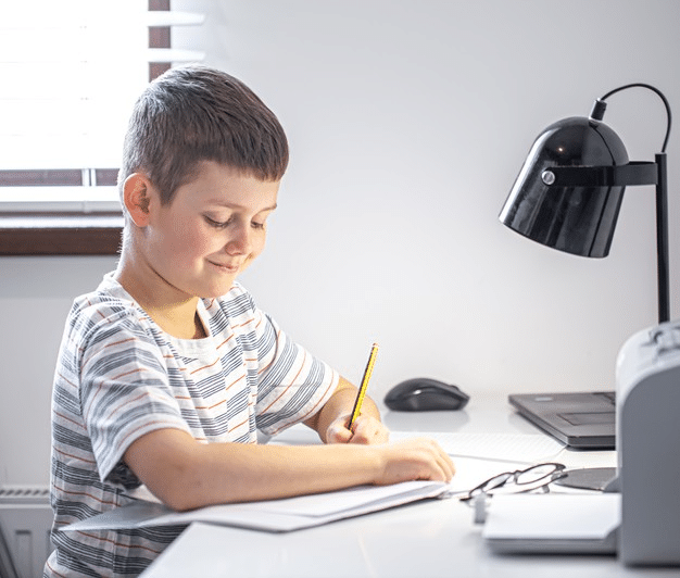 a young student attending online school