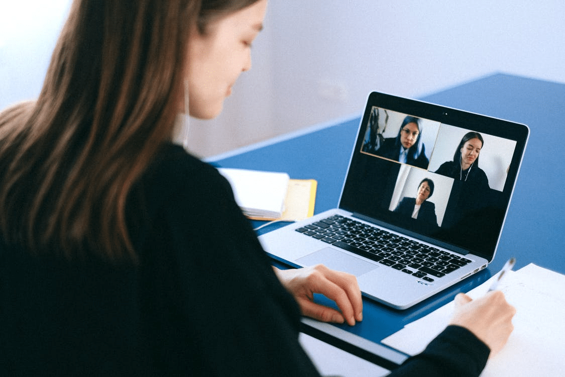 a young student reaching out to her teachers for additional help with online school