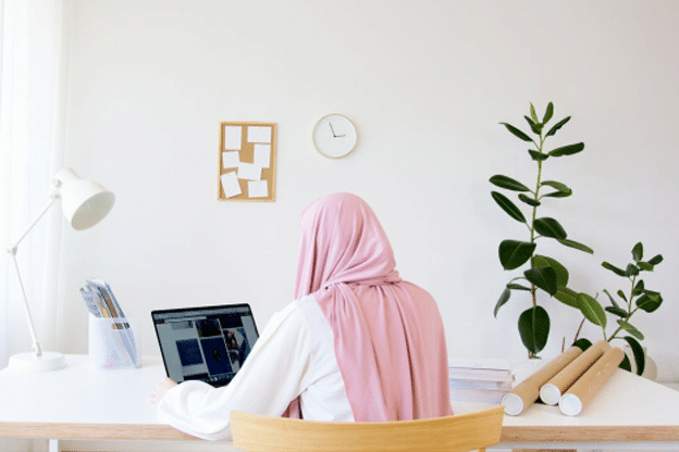 an Arab mother researching online schools for her daughter