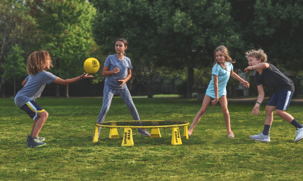 children playing in a park after their online classes