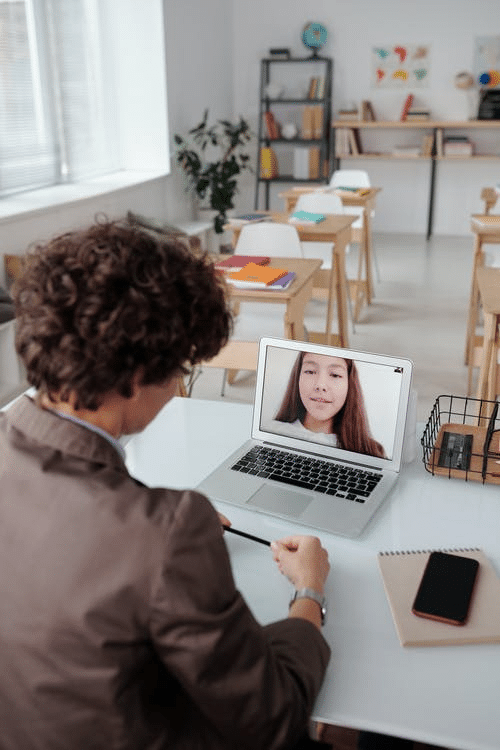 a school counsellor checking in with a student