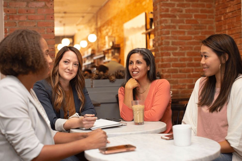 parents discussing their children’s online schooling experiences