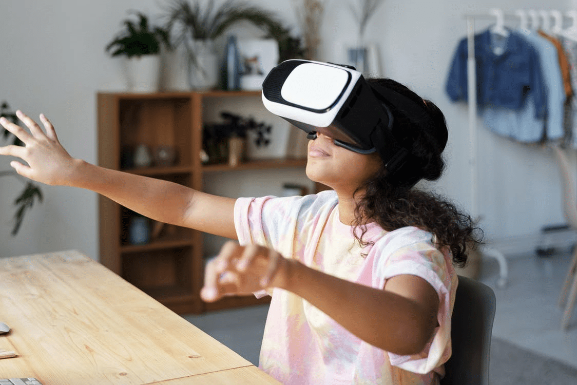 a student performing a class activity with a VR headset