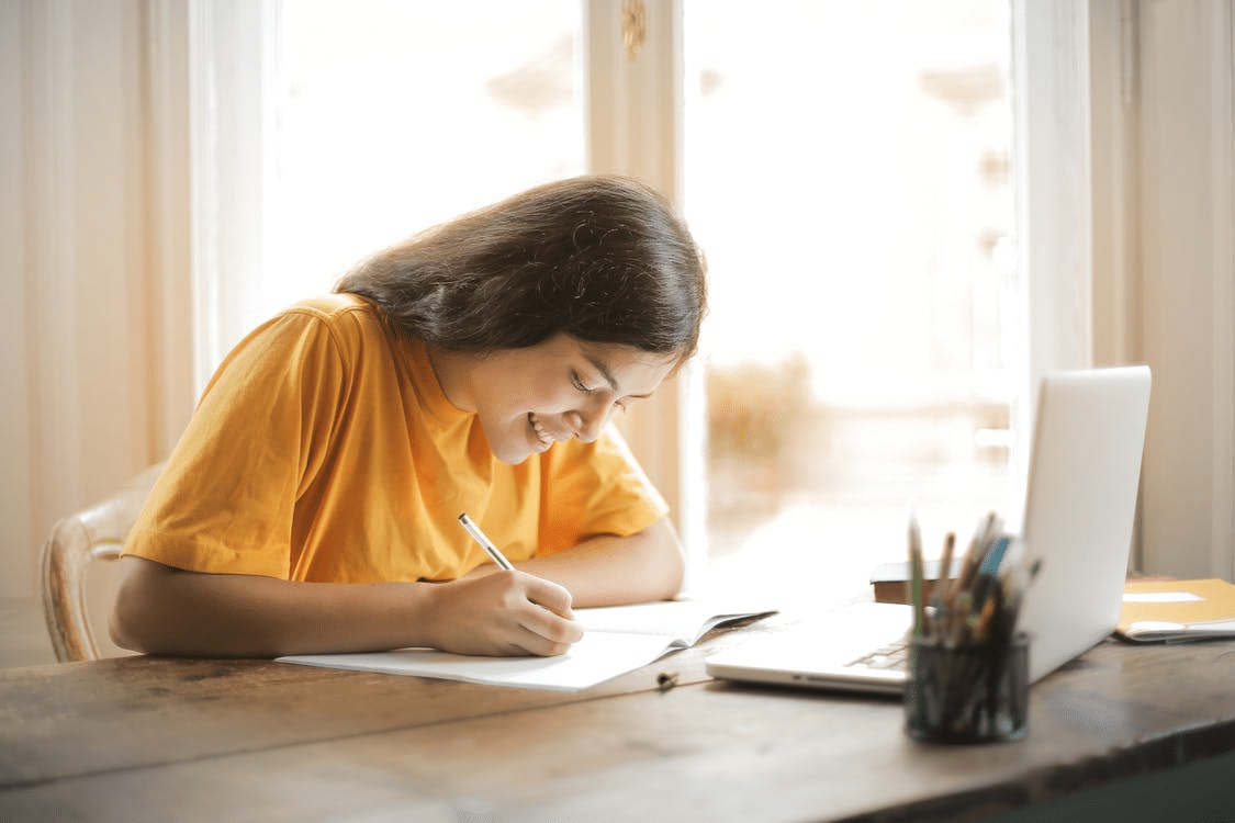 a student completing her homework