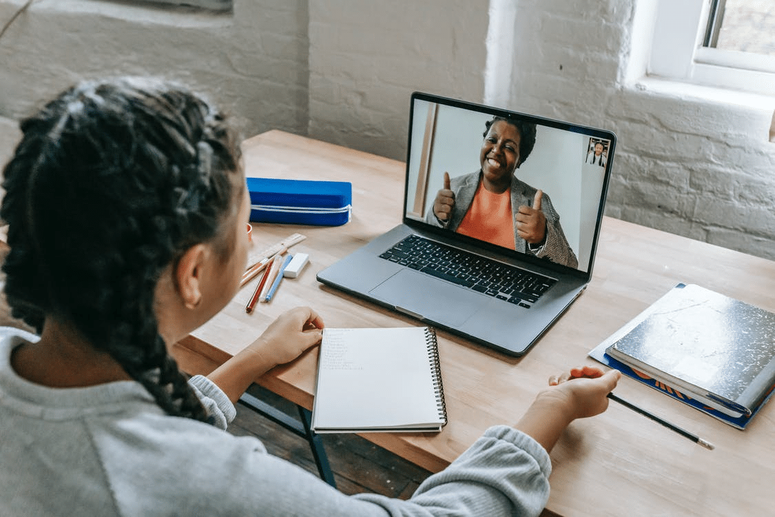 a student attending her online class in Johannesburg