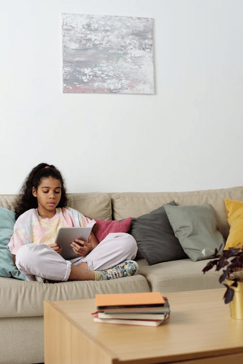 a student revising for her online classes in Jordan