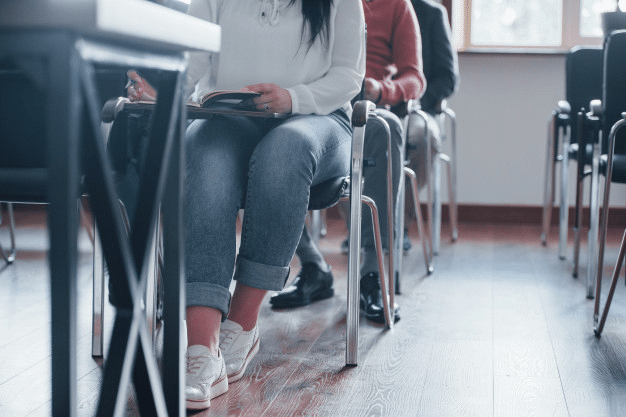 students sitting in a conventional classroom