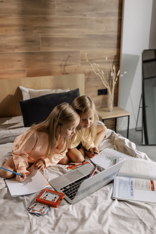young girls online school activity